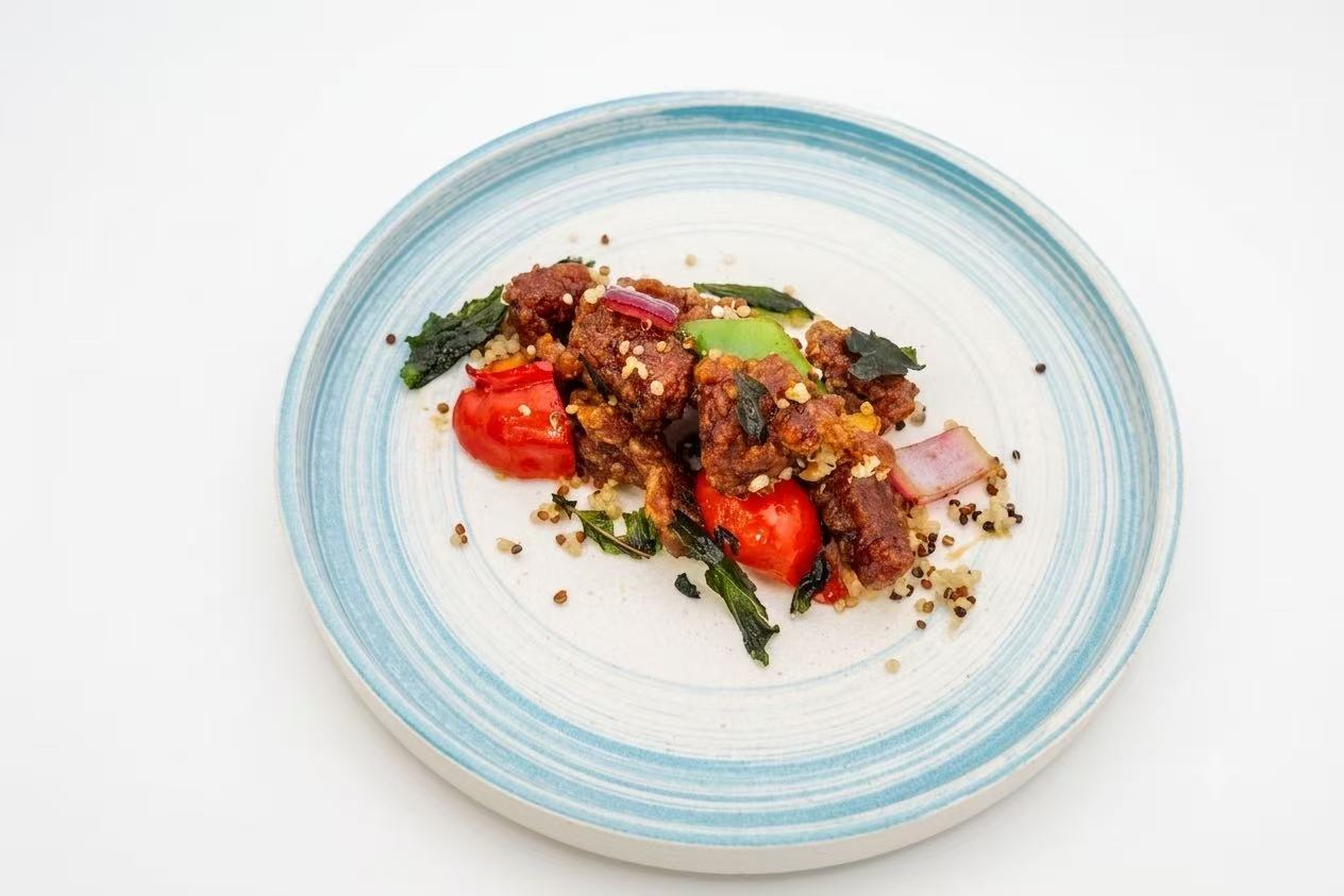 Crispy basil beef with quinoa